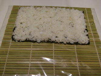 Spread the rice all over the nori sheet